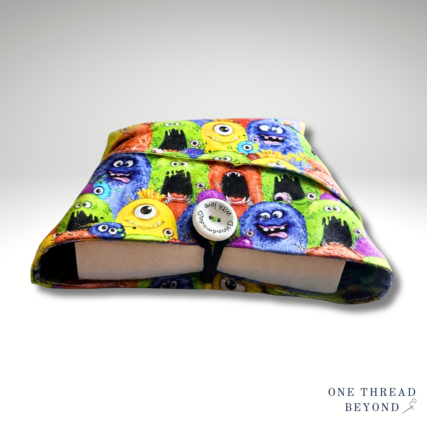 Colourful monsters fun book sleeve, padded book protector, book jacket, bookmark